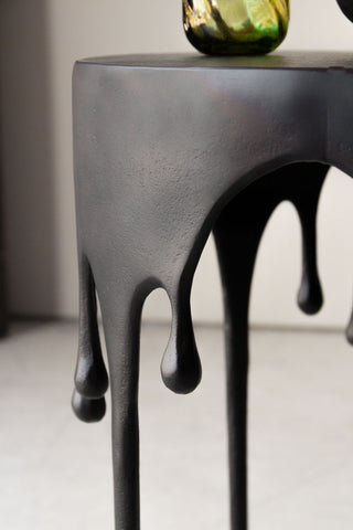 Close-up image of the drips on the Matt Black Drip Side Table