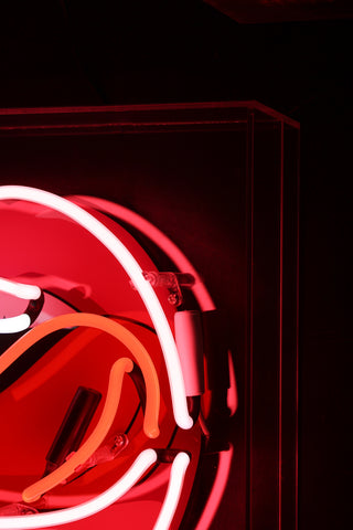 Detail image of the top right hand corner of the neon light