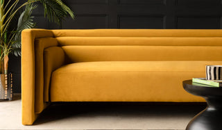 Landscape image of the Mustard Art Deco Stepped Sofa