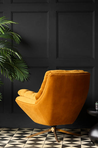 Image of the back of the Mustard Velvet Swivel Chair