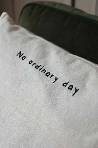 Detail of the writing on the No Ordinary Day Monochrome Cushion