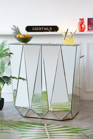 Lifestyle image of the stunning shard mirrored bar table