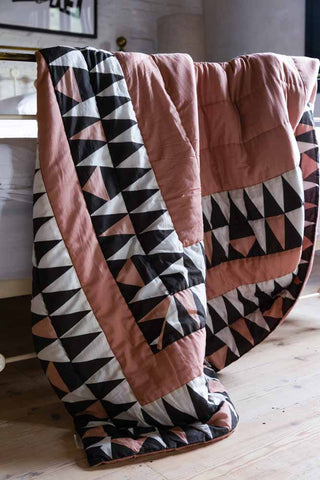 Close-up image of the King Size Pink & Black Geometric Pattern Quilt