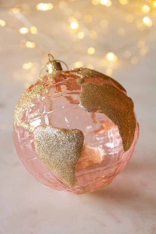 Lifestyle image of the Pink & Gold Globe Christmas Decoration