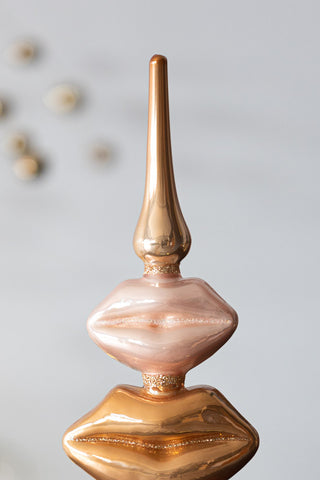 Close-up image of the Powdered Opal Lips Christmas Tree Topper