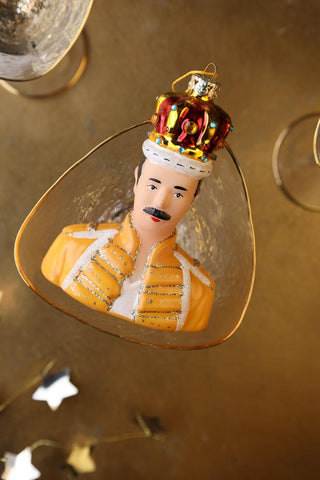 Image of the Freddie Inspired Christmas Tree Decoration in a champagne glass. 