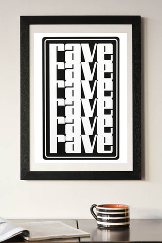 Lifestyle image of the Rave A2 Typographic Art Print With Black Wooden Frame