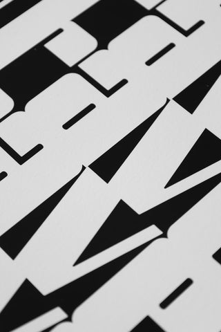 Close-up image of the Rave A2 Typographic Art Print With Black Wooden Frame