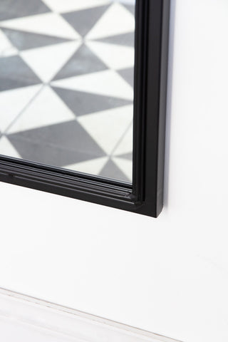 Close-up image of the frame on the corner of the Rectangular Windowpane Mirror