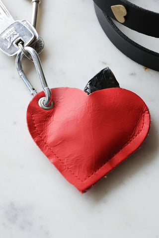 Lifestyle image of the Red Heart Dog Poo Bag Pouch