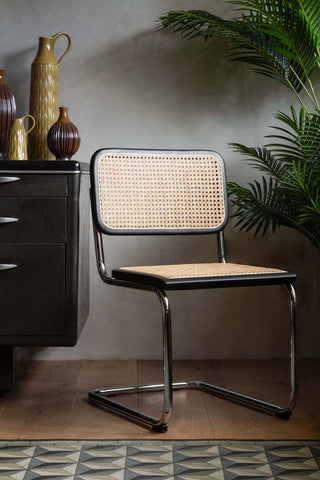 Lifestyle image of the Retro Chrome & Woven Cane Dining Chair