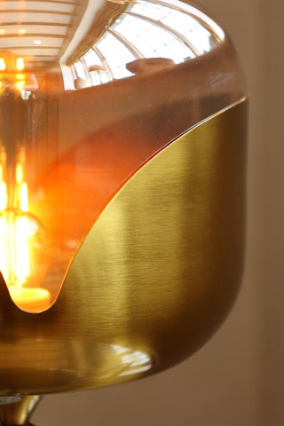 Image of the gold detail on the Retro Golden Glass Tripod Table Lamp