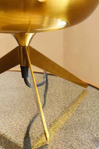 Image of the tripod stand on the Retro Golden Glass Tripod Table Lamp