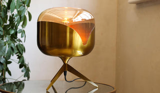 Landscape image of the Retro Golden Glass Tripod Table Lamp