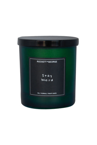 Image of the Rockett St George Green Stay Weird Scented Candle on a white background