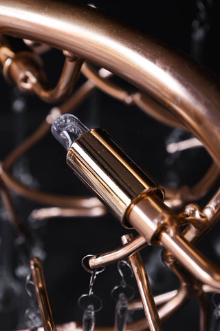 Close-up image of the bulb holder on the Rose Gold Droplet Chandelier