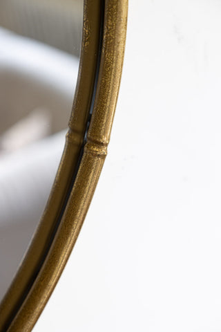 Image of the finish for the Round Antique Gold Wall Mirror