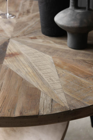 Close-up image of the Round Elm Twisted Dining Table