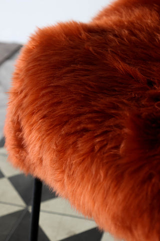 Close-up image of the Rust Sheepskin Rug