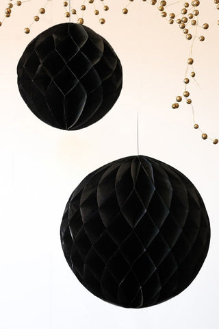 Lifestyle image of the Set Of 2 Black Honeycomb Ball Decorations