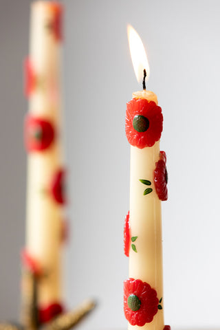 Close-up image of the Set Of 2 Red Flower Tapered Candles