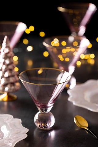 Christmas lifestyle image of the Set Of 4 Gold Rim Rose Tinted Martini Glasses