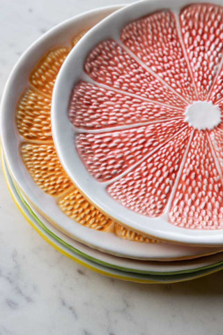 Detail image of all 4 of the Set Of 4 Grapefruit Plates