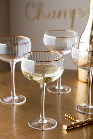 Image of the Set Of 4 Ribbed Champagne Coupe Glasses With Gold Rim