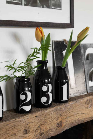 Image of the Set Of 4 Vintage Style Numbered Black Bottles with tulips in