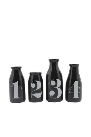 Image of the Set Of 4 Vintage Style Numbered Black Display Bottles on a white background