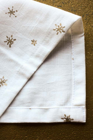 Image of the material for the Set Of 4 White Napkins With Gold Stars