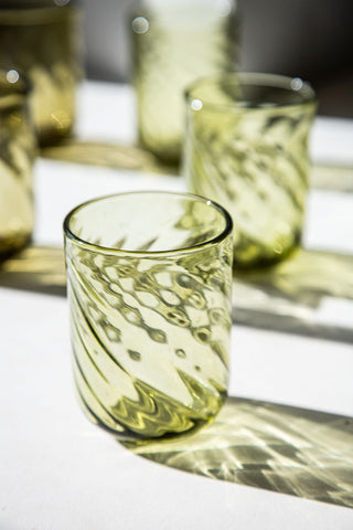 Close-up image of one glass from the Set Of 6 Green Twist Water Glasses