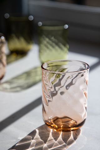 Close-up image of the pink glass from the Set Of 6 Twist Water Glass - Pink & Green