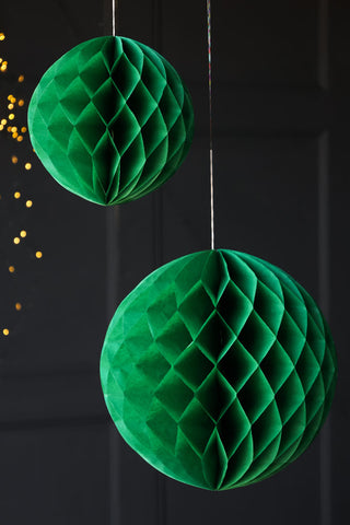 Lifestyle image of the Set Of 2 Dark Green Honeycomb Ball Decorations