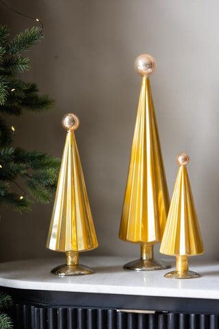 Lifestyle image of the Luxury Set Of 3 Golden Yellow Pleated Christmas Trees
