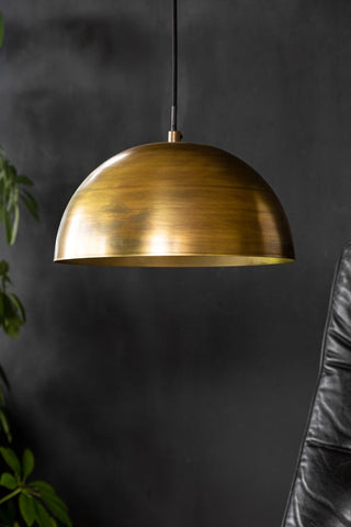 Lifestyle image of the Small Brass Dome Pendant