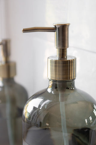 Close-up image of the gold nozzle on the Smoked Glass Soap Dispenser Bottle