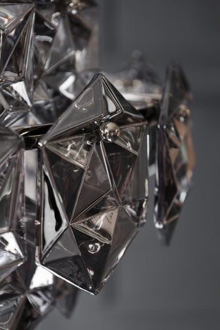 Close-up image of the detail on the Smoked Showstopping Multi-Layer Glass Chandelier
