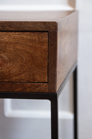 Close-up image of the edge of the drawer on the Split Level 2-Drawer Mango Wood Bedside Table