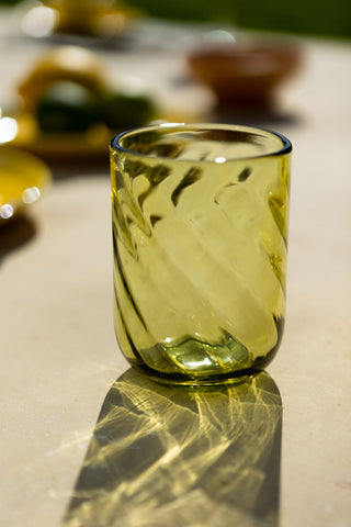 Close-up image of the Green Twist Water Glass