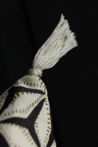 Image of the tassel for the Monochrome Star Cotton Cushion