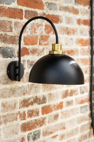 Lifestyle image of the Statement Dome Outdoor Wall Light