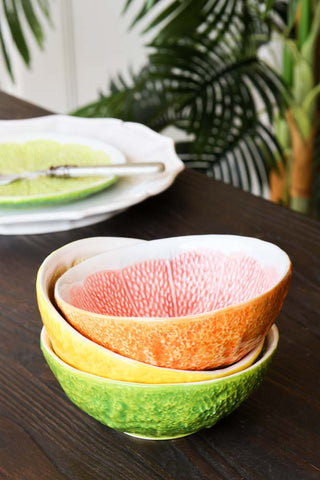 Image of the orange, yellow and green grapefruit bowls