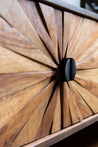 Angled close-up image of the pattern on the Sunburst TV Stand