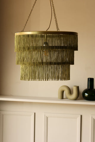 Lifestyle image of the Three-Tier Fringe Chandelier - Avocado Green