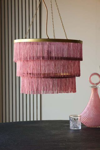Lifestyle image of the Pink Three-Tier Fringe Chandelier
