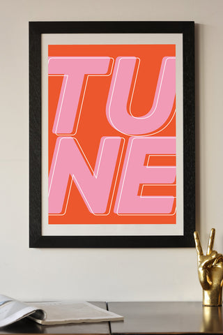 Lifestyle image of the Tune By Native State A2 Typographic Art Print With Black Wooden Frame