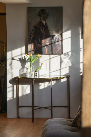 Lifestyle image of the Venetian Mirrored Console Table in a living room