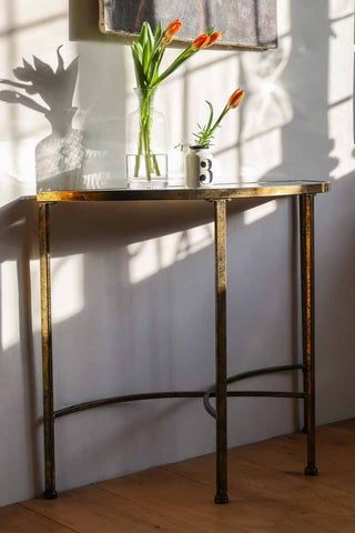 Angled lifestyle image of the Venetian Mirrored Console Table