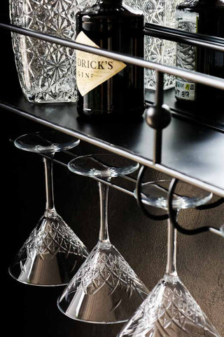 Close-up image of the Wall-Mounted Black Metal Bar Shelf With Mirror